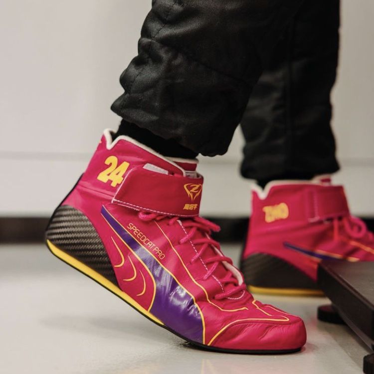 F1-style racing shoes with low-profile sole for pedal control