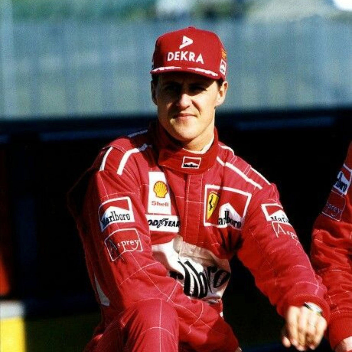 Michael Schumacher Racing Suit Replica 1997: michael Schumacher F1 Race Replica Ferrari Motorsport Suit Close-up View.