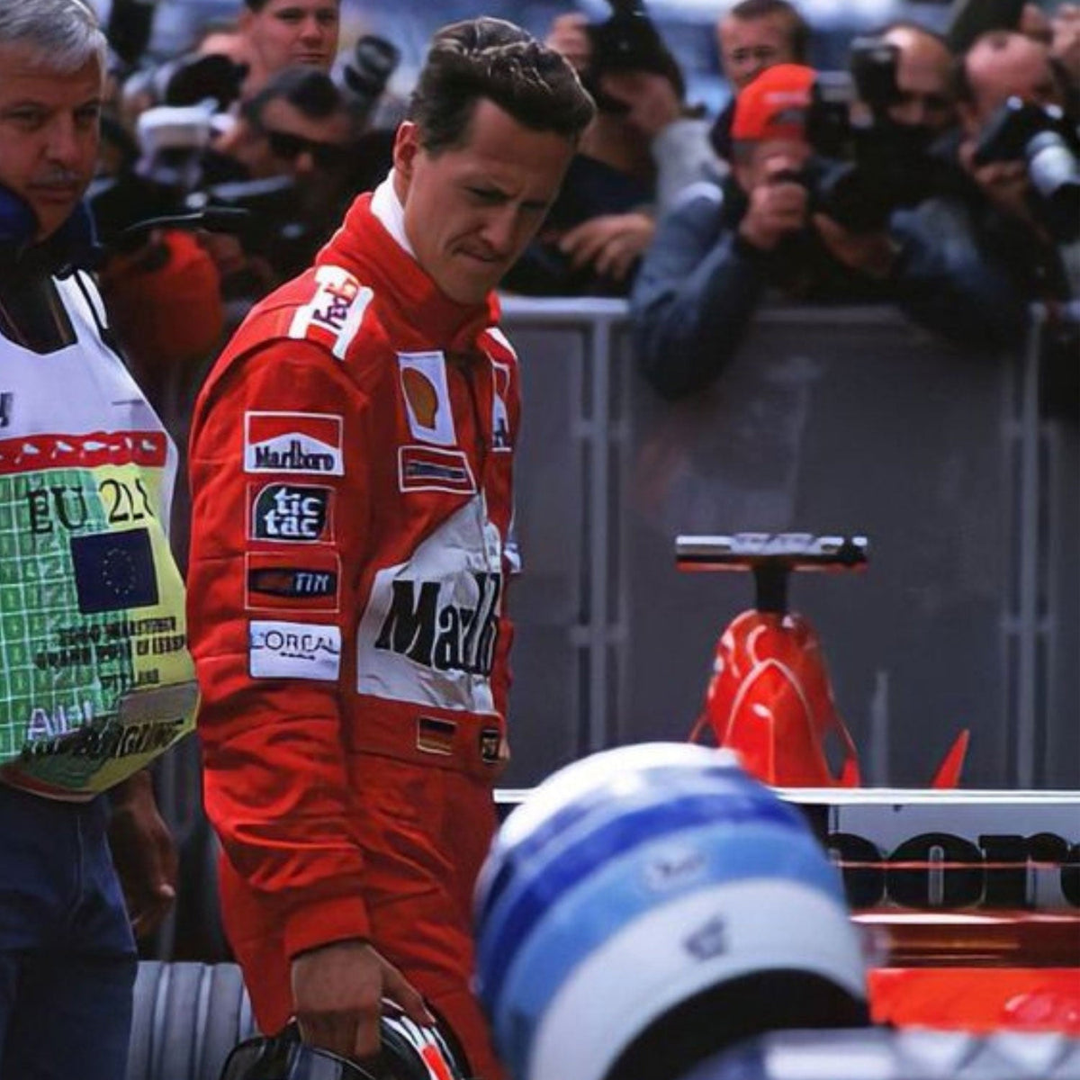 Michael Schumacher 2002 Racing Suit Replica: michael Schumacher F1 Race Ferrari Driver Suit Close-up View.