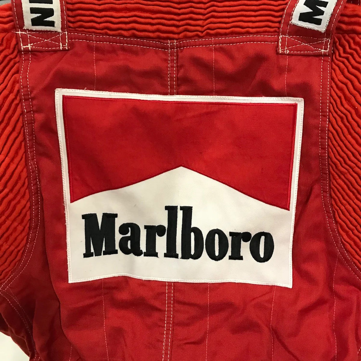 Niki Lauda Racing Suit Replica 1984: niki Lauda 1984 F1 Race Costume Replica McLaren World Championship Winning Season Red fabric with a Marlboro logo patch.
