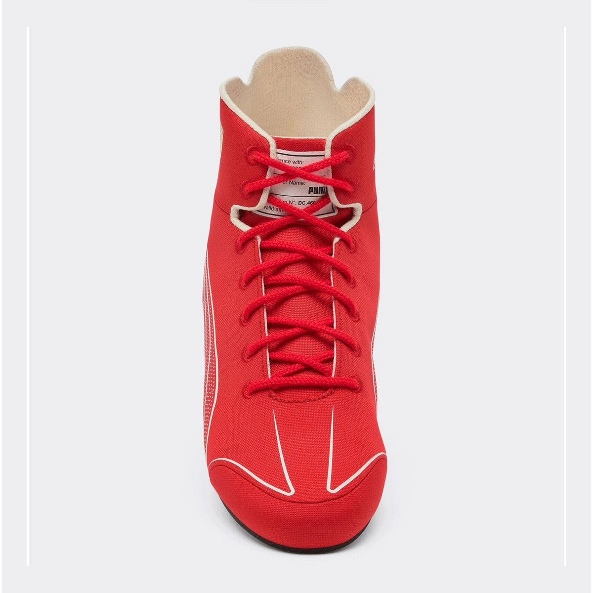 Lewis Hamilton Racing Shoes Replica 2026: a red Puma Scuderia Ferrari high-top racing sneakers with white graphic lines, a black textured heel, and the yellow Ferrari prancing horse logo on the side.