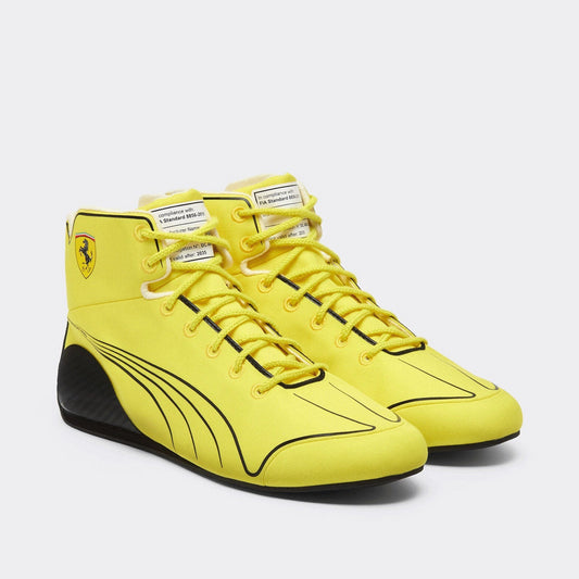 2026 Lewis Hamilton British GP Racing Shoes Replica: a pair of yellow high-top racing sneakers with black accents, featuring the Scuderia Ferrari logo on the side and Puma stripes.