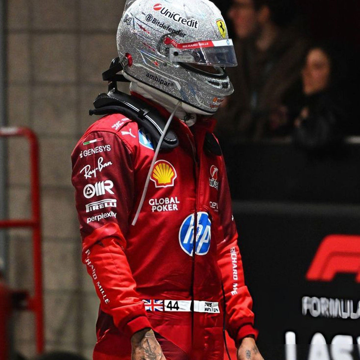 2025 Lewis Hamilton Las Vegas GP Racing Suit Replica: lewis Hamilton 2025 F1 Race Suit Ferrari Las Vegas GP with various sponsor logos, wearing a helmet with a Ferrari logo.