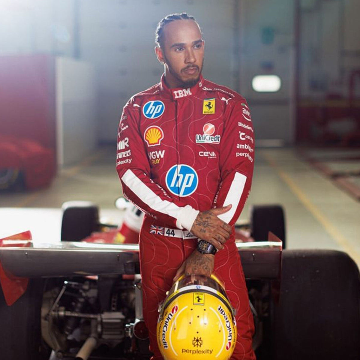 2025 Racing Suit Replica – Lewis Hamilton Monza GP: lewis Hamilton 2025 F1 Race Replica Costume Ferrari Monza GP with various sponsor logos standing next to a Formula 1 car.